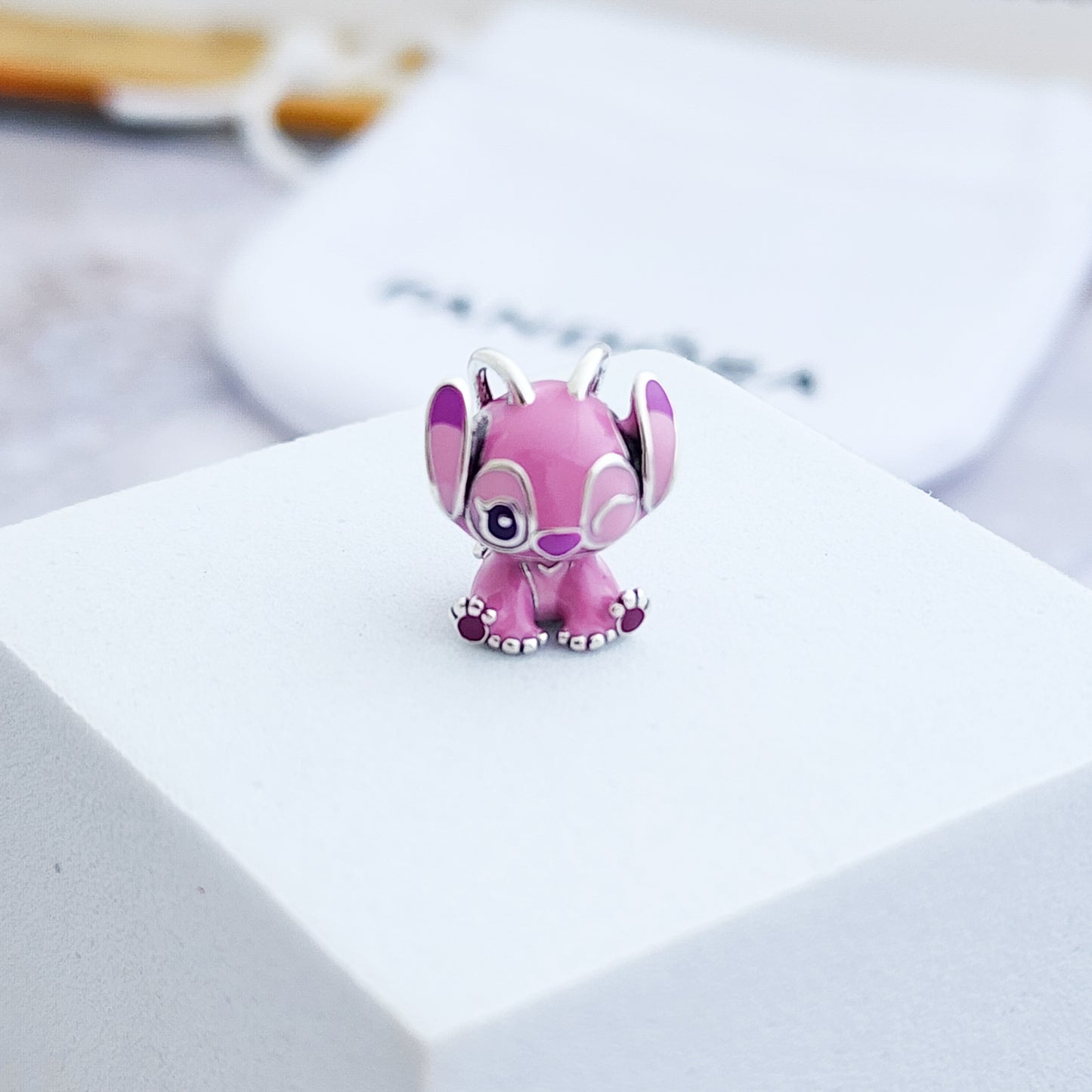 Charm Stich Rosa