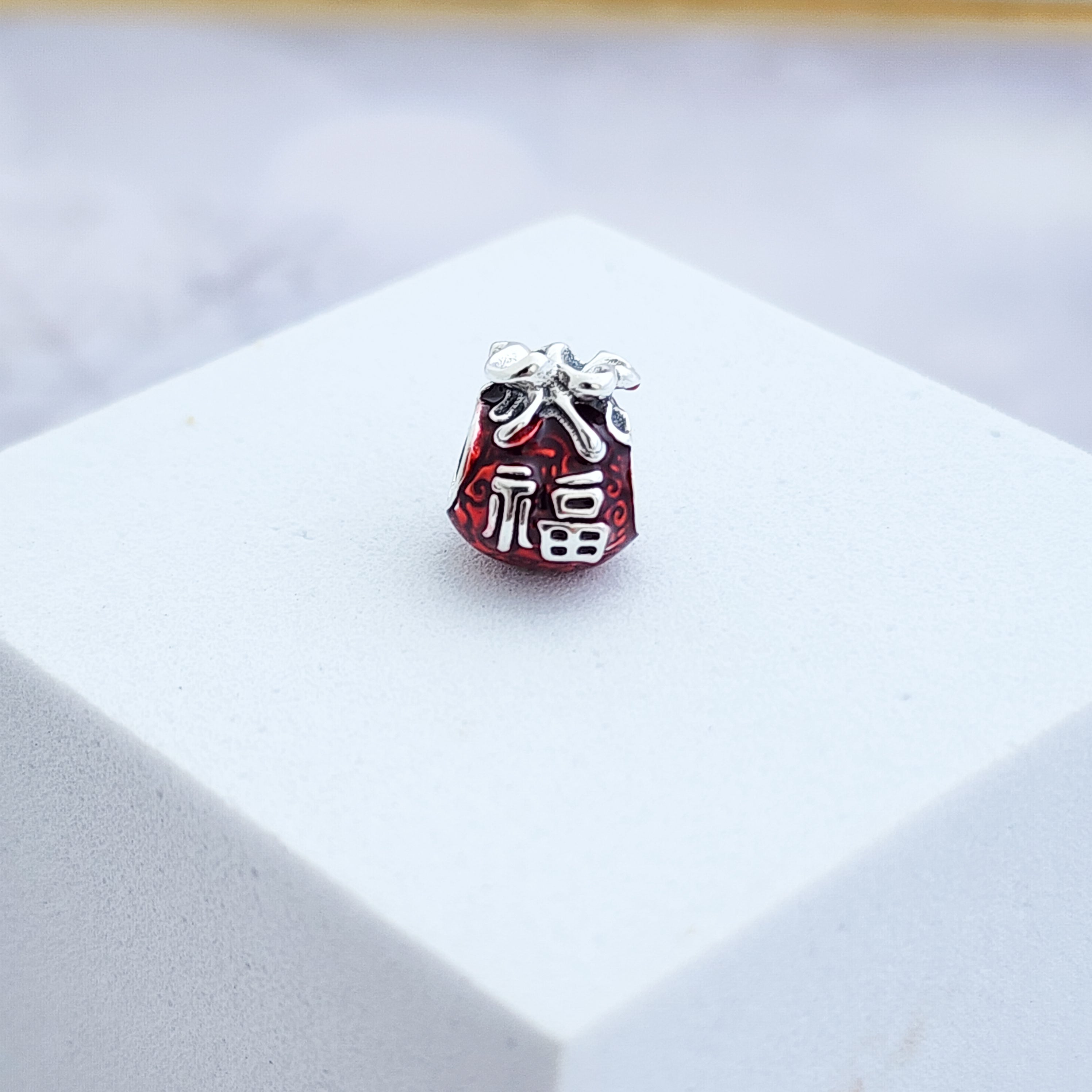 Charm Bolsa Dinero en Mandarín