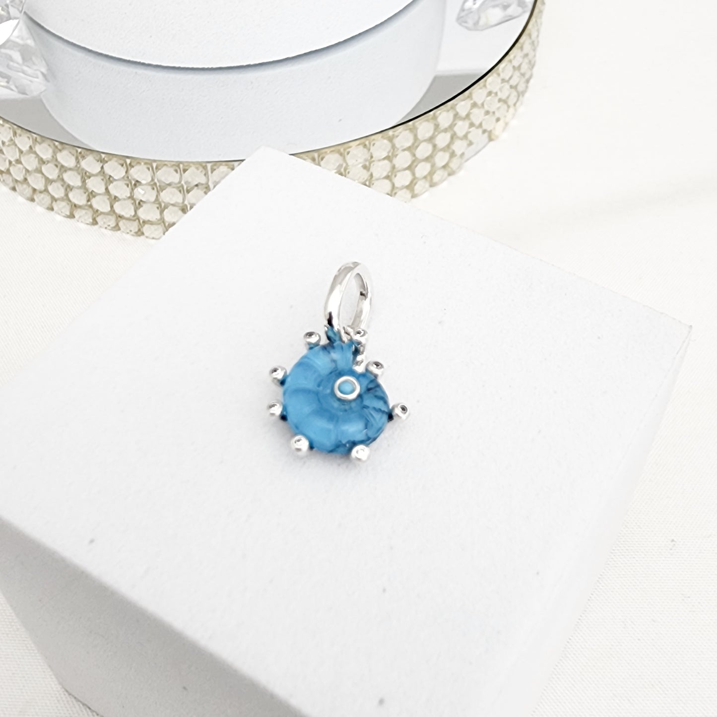 Charm caracola