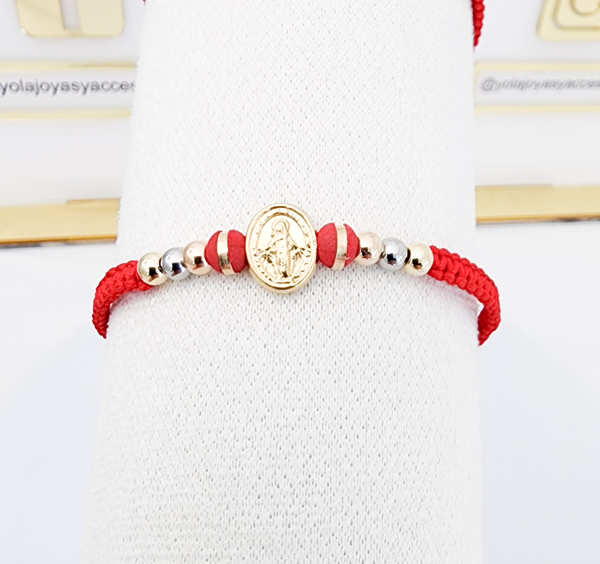 Pulsera tejida San benito oro laminado