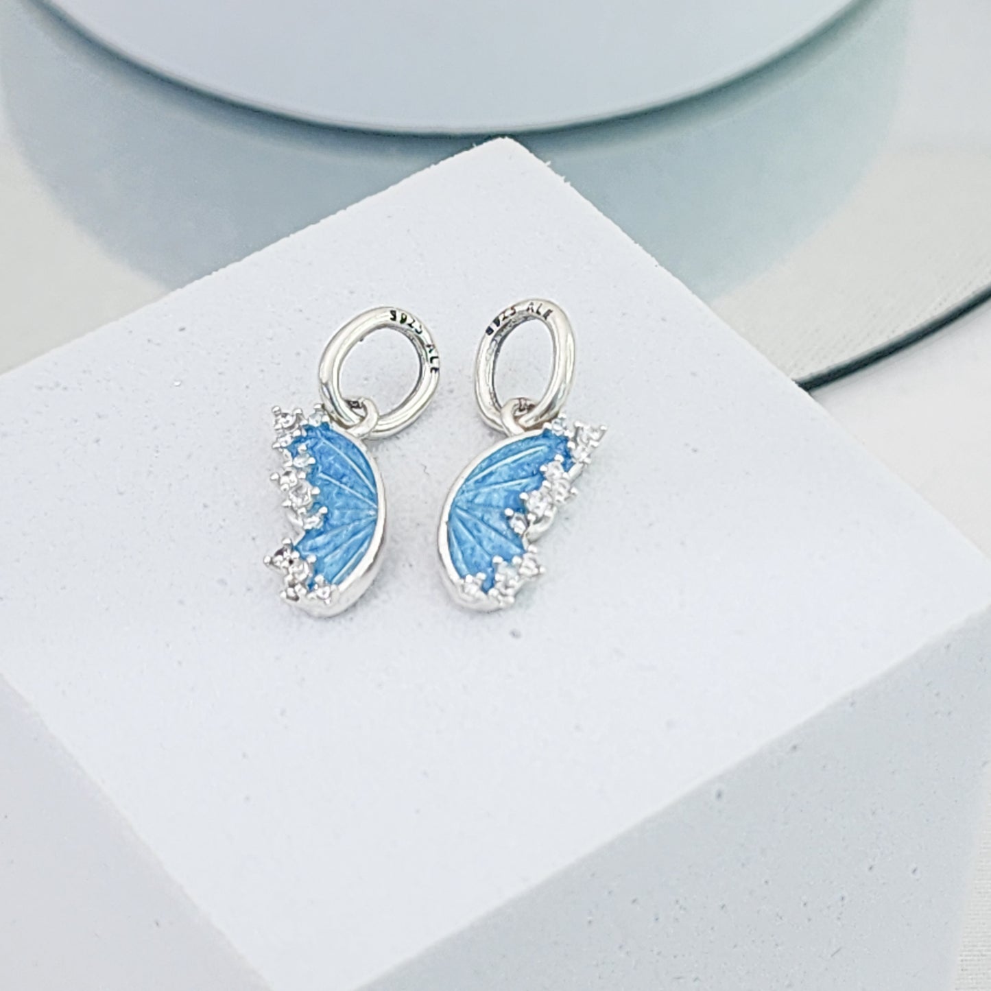 Charm alas doble