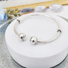 Pulsera rigida abierta