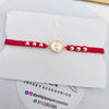 Pulsera tejida Virgen oro laminado