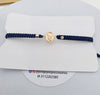 Pulsera tejida San Miguel oro laminado