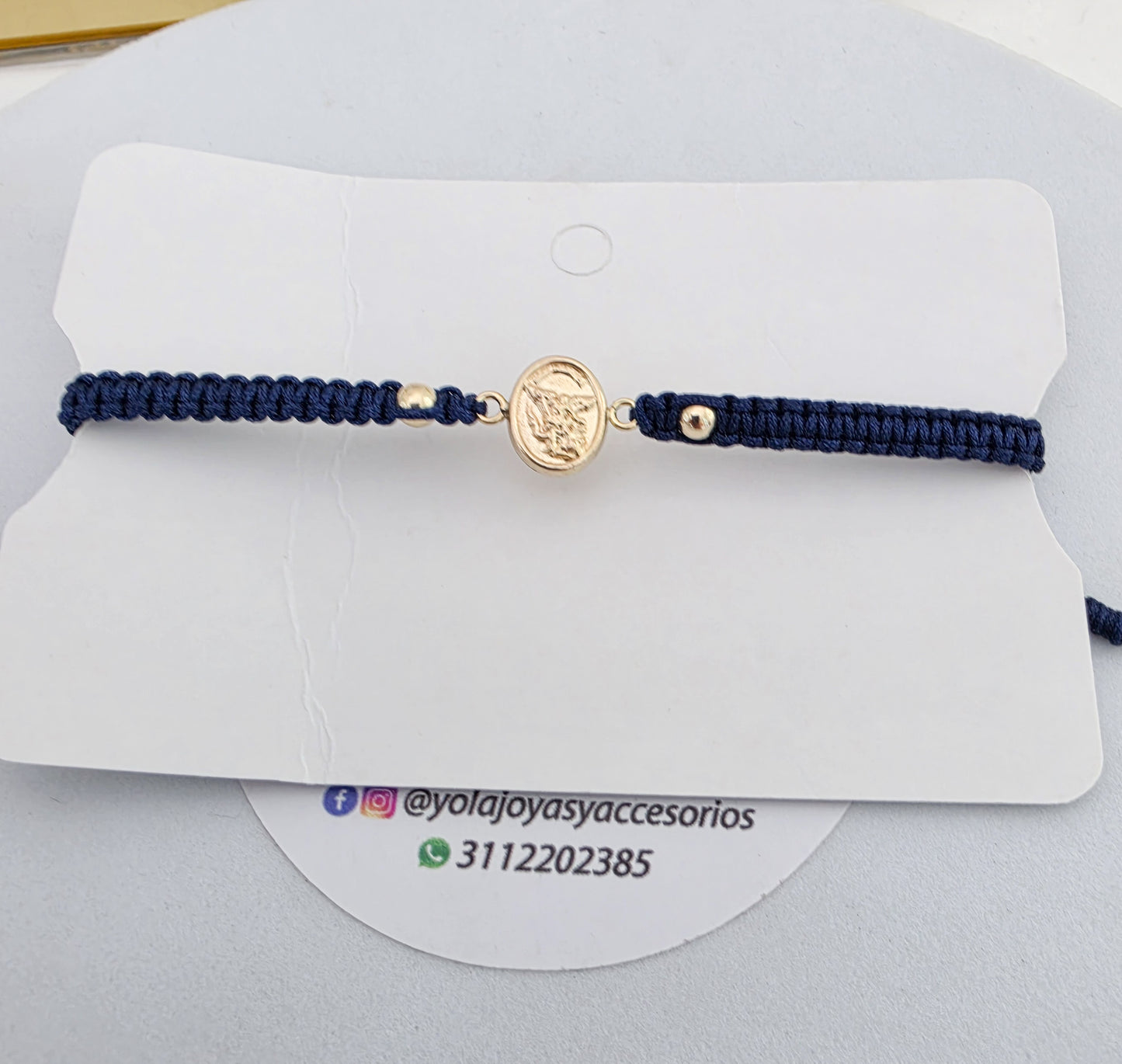 Pulsera tejida San Miguel oro laminado