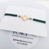 Pulsera tejida trebol oro laminado