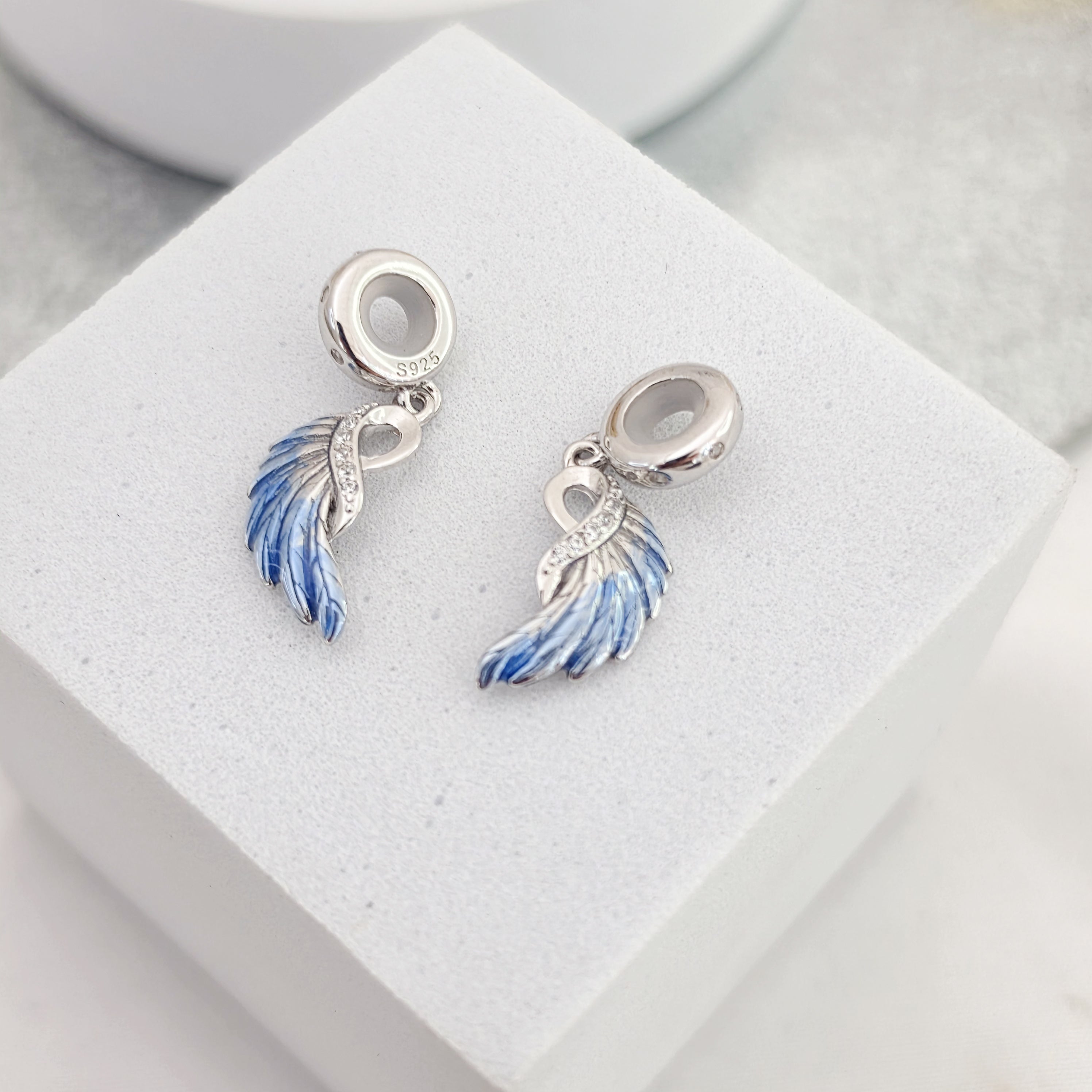 Charm alas doble