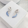 Charm alas doble