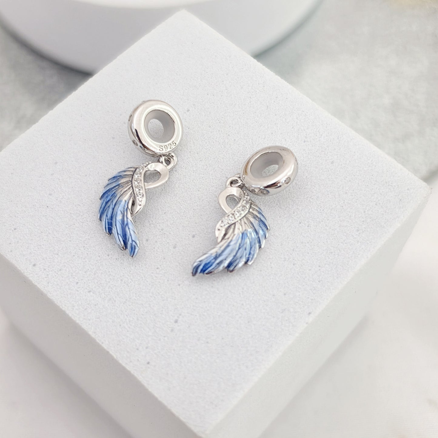 Charm alas doble