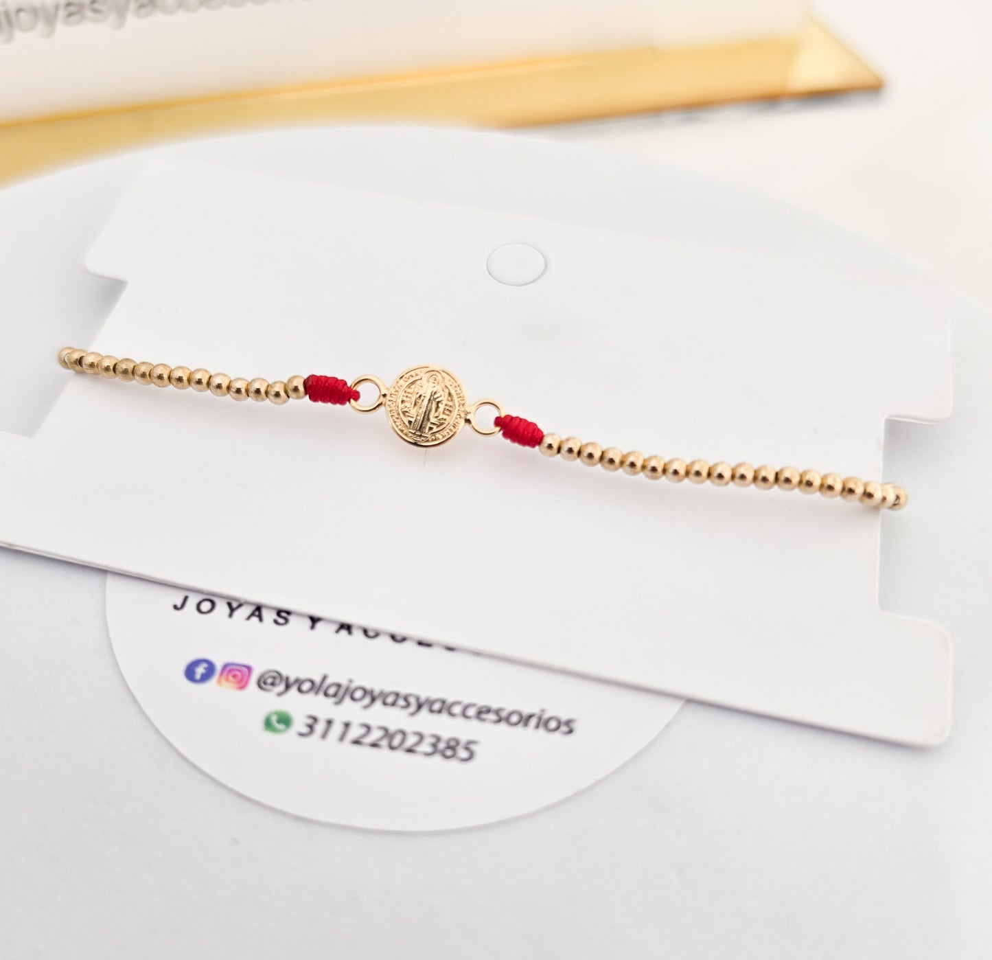 Pulsera Tejida oro laminado San Benito