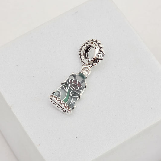 Charm rosa bella y bestia