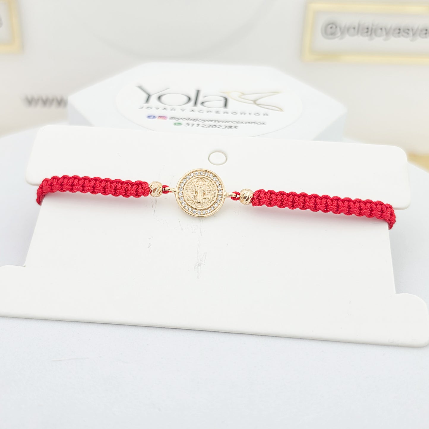Pulsera tejida San Benito  oro laminado