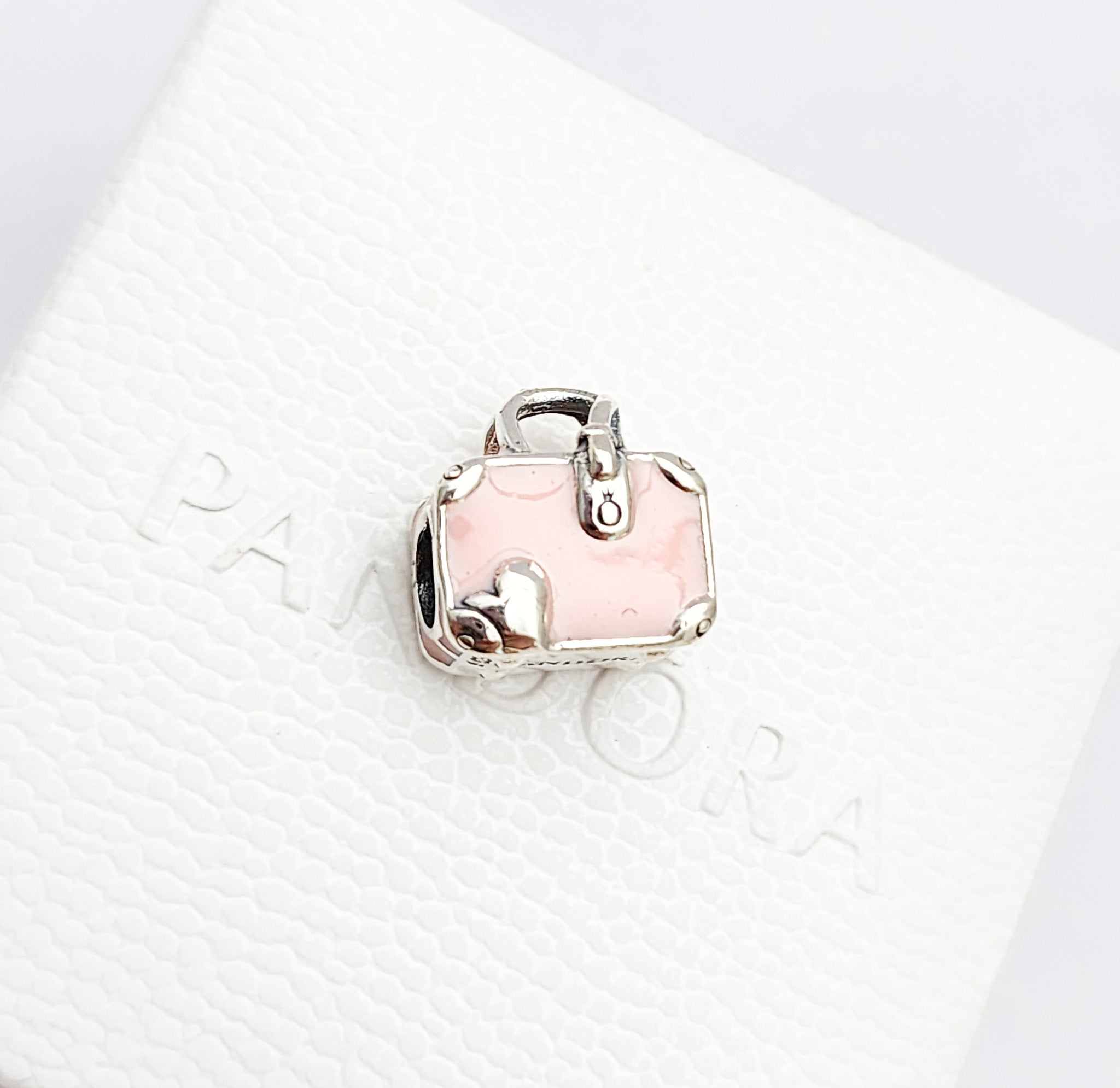 Charm  maleta rosa